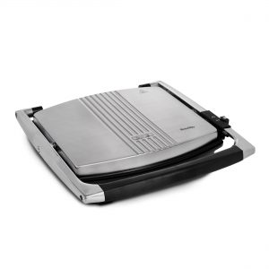 Grillpress i rostfritt stål, stilren design för perfekt grillning hemma.